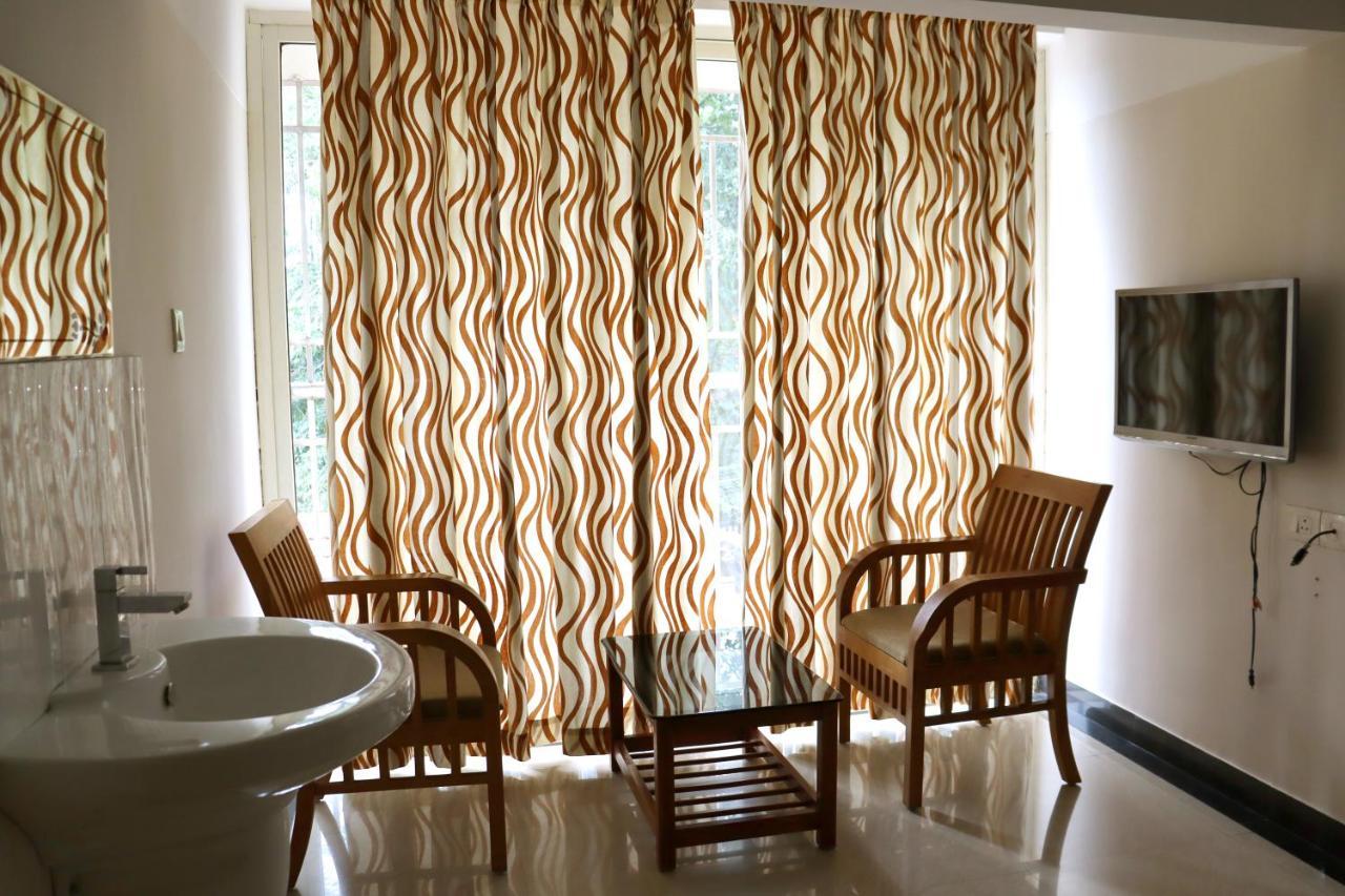 Uthradam Towers Hotel Thiruvananthapuram Bagian luar foto